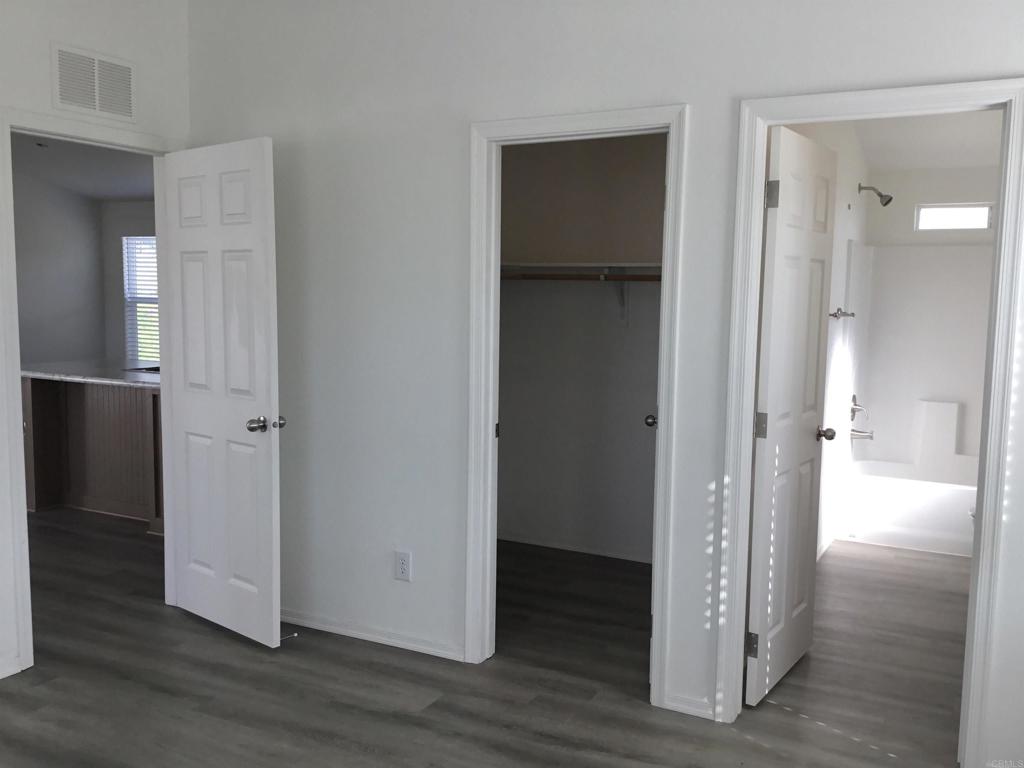 622 Rancho Del Cerro Fallbrook, CA 92028 - Photo 55 of 58 a view of a hallway with wooden floor