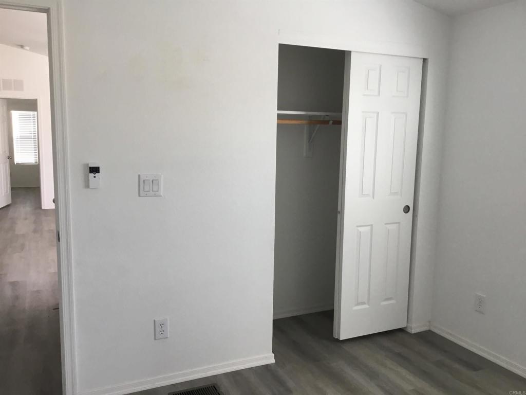 622 Rancho Del Cerro Fallbrook, CA 92028 - Photo 56 of 58 a view of empty room with wooden floor