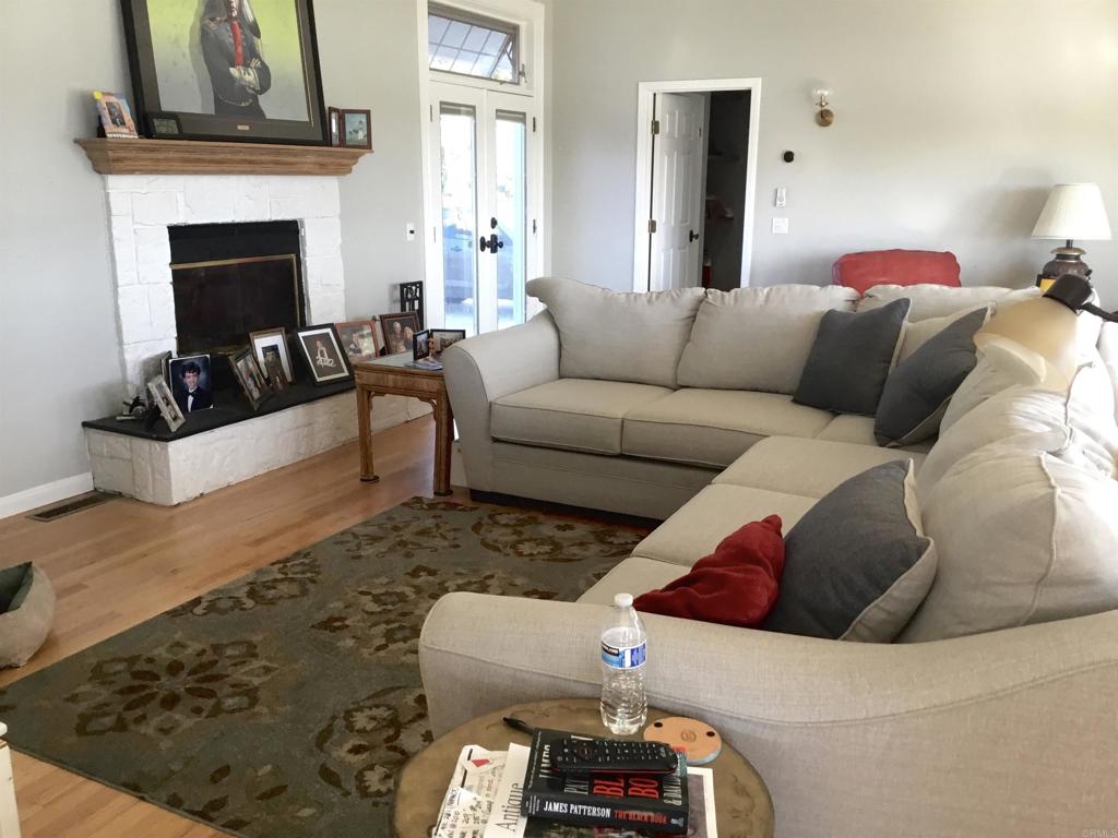 622 Rancho Del Cerro Fallbrook, CA 92028 - Photo 7 of 58 a living room with furniture and a fireplace