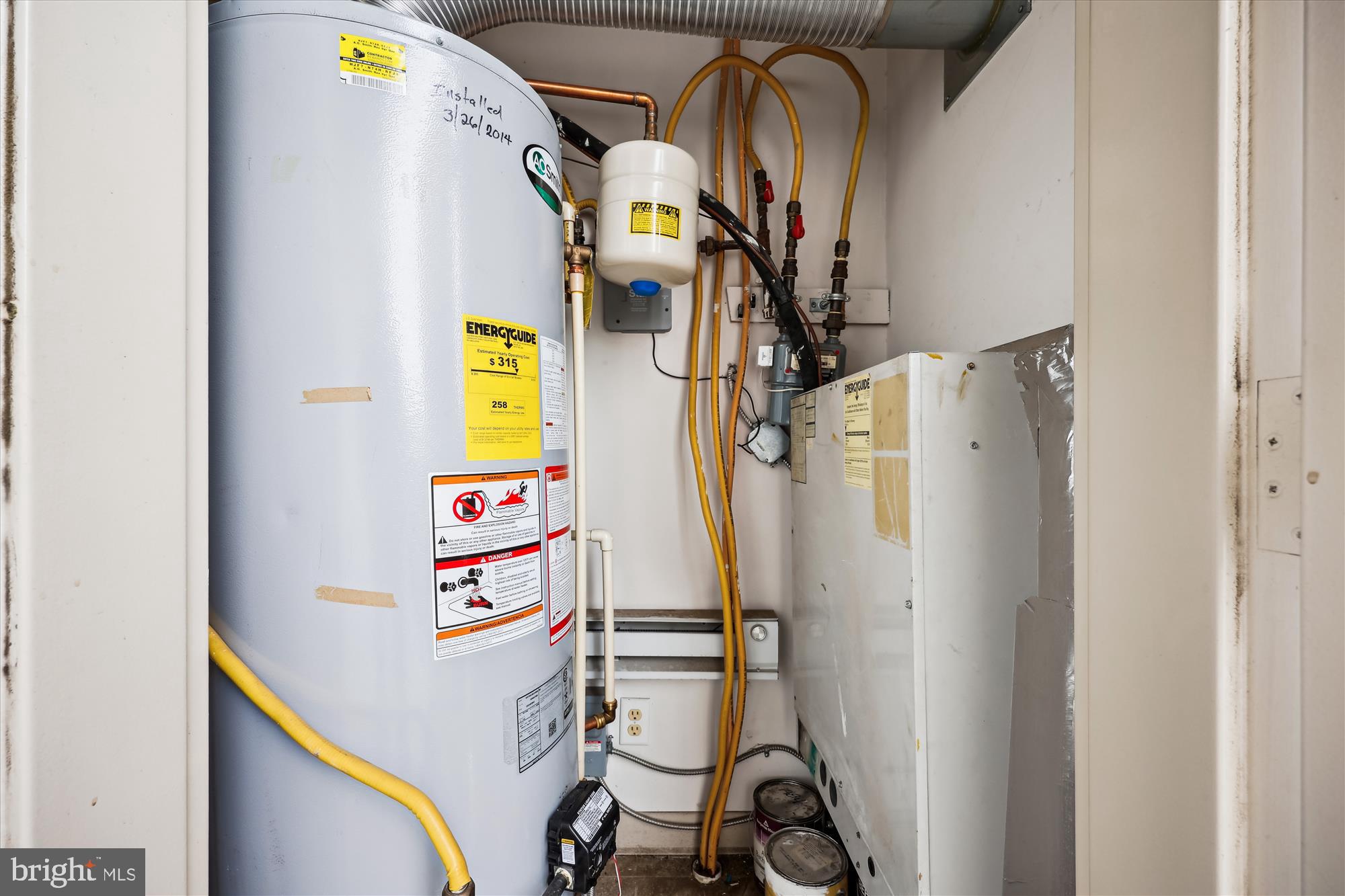 8045 Newell Street, Unit 319 Silver Spring, MD 20910 - Photo 36 of 66 a utility room with dryer and washer