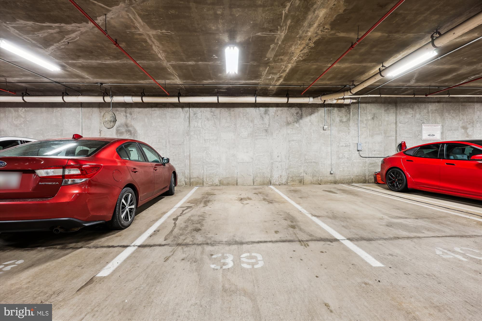 8045 Newell Street, Unit 319 Silver Spring, MD 20910 - Photo 38 of 66 a view of parking garage with cars