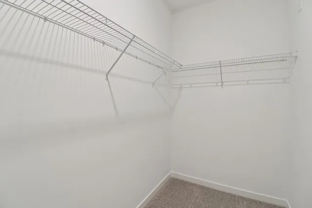 a view of a room with racks on the wall