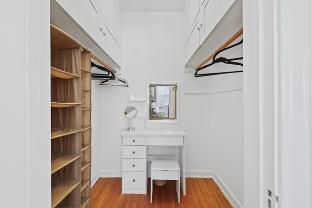 a backyard of a house with lots of green space and plants