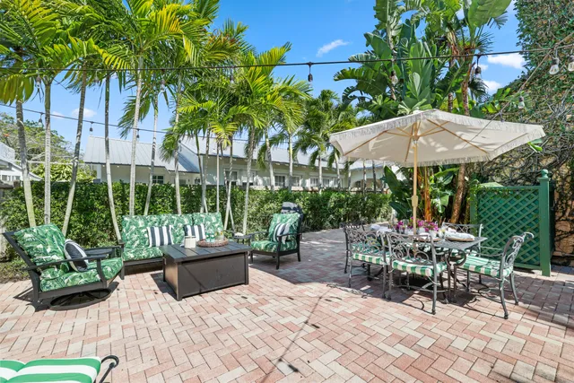 a kitchen with a stove a sink and a refrigerator