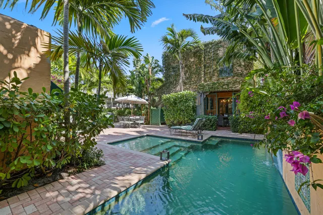 a bedroom with a bed and dresser