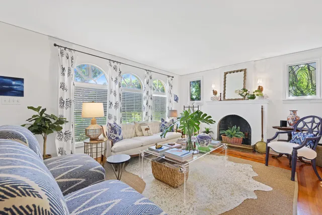 a bedroom with furniture and a flat screen tv