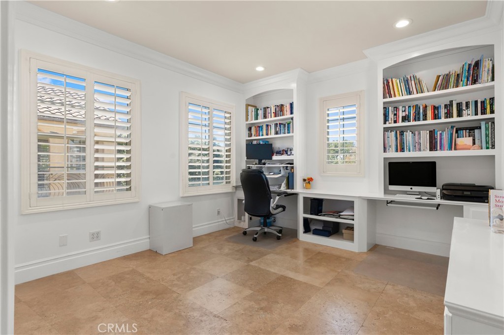 6572 Beachview Drive Huntington Beach, CA 92648 - Photo 8 of 17 a view of a livingroom with workspace and a window