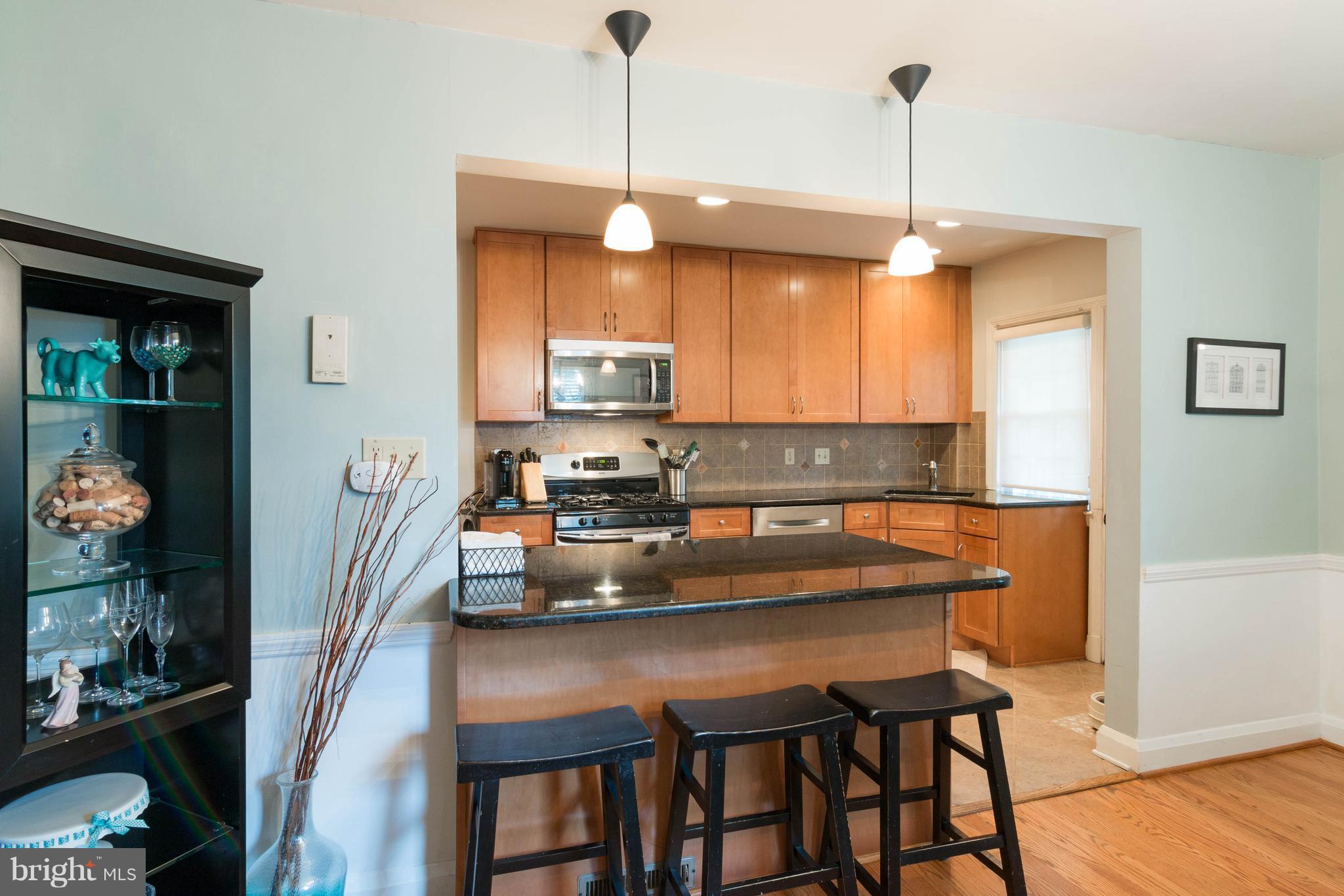 101 Hopkins Road Baltimore, MD 21212 - Photo 6 of 30 Kitchen open to dining room