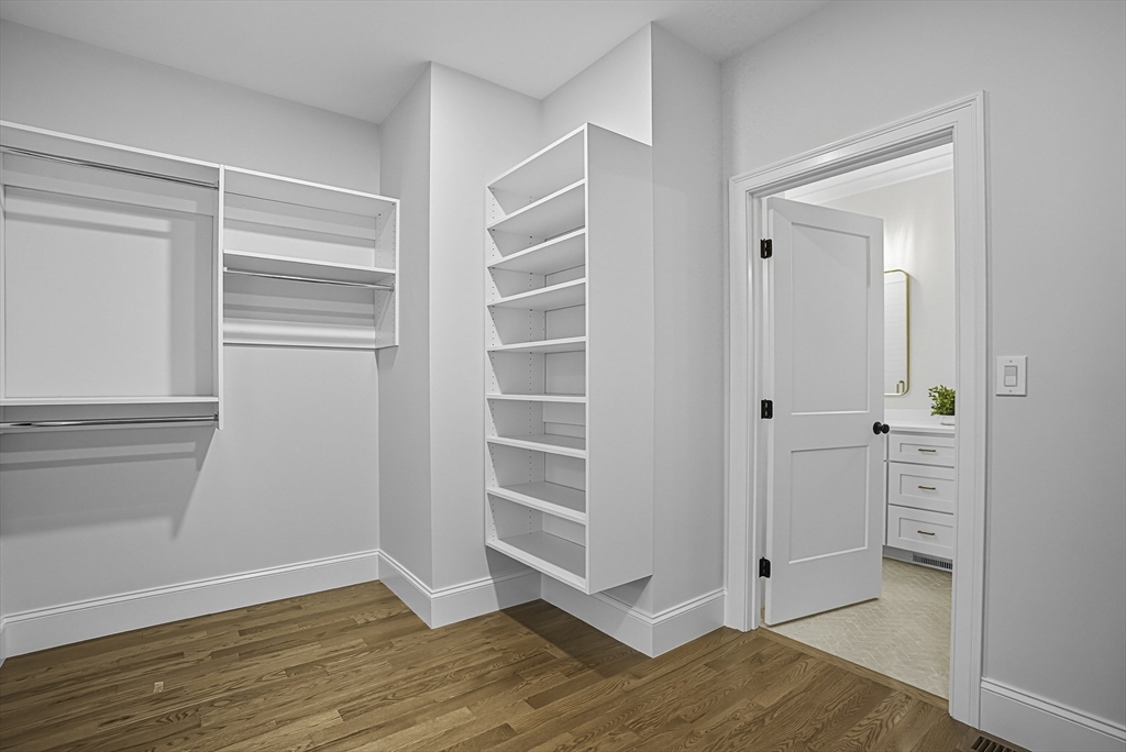 7 Waterville Lane, Unit 7 Hopkinton, MA 01748 - Photo 14 of 31 a view of walk in closet with empty racks