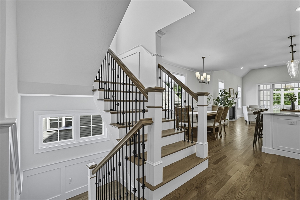 7 Waterville Lane, Unit 7 Hopkinton, MA 01748 - Photo 6 of 31 a view of entryway and hall with wooden floor