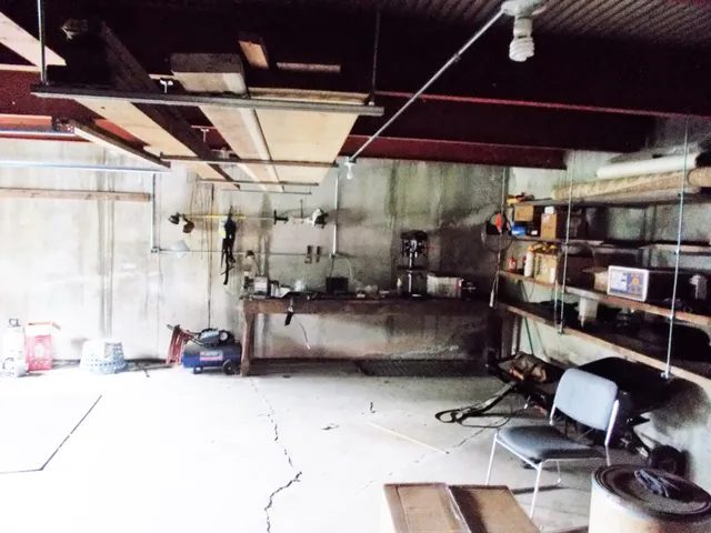 a gym room with lots of gym equipment