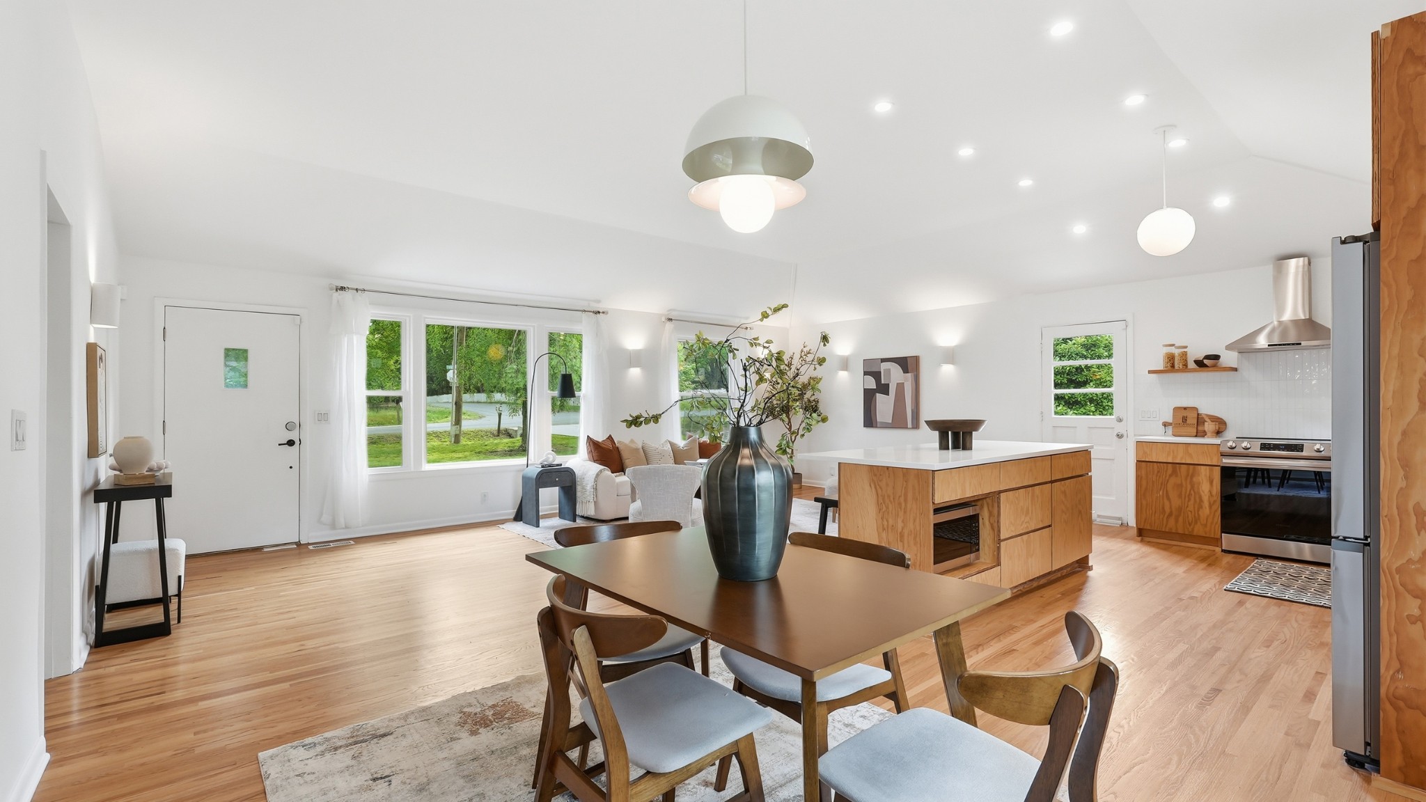 2101 Porter Road Nashville, TN 37216 - Photo 13 of 48 a view of a dining room with furniture window and wooden floor