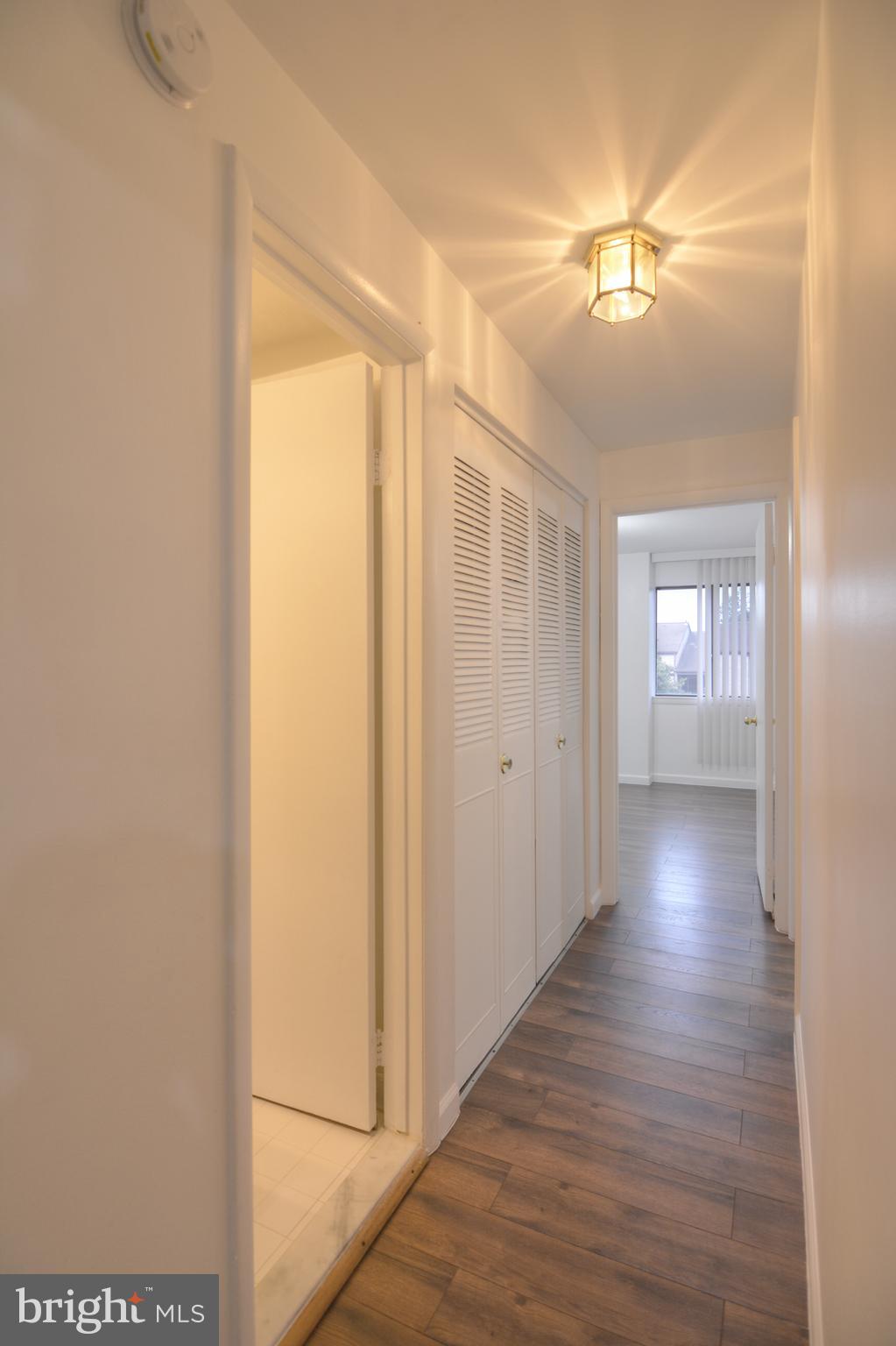 18905 Smoothstone Way, Unit I3 Gaithersburg, MD 20886 - Photo 21 of 32 a view of gallery with wooden floor