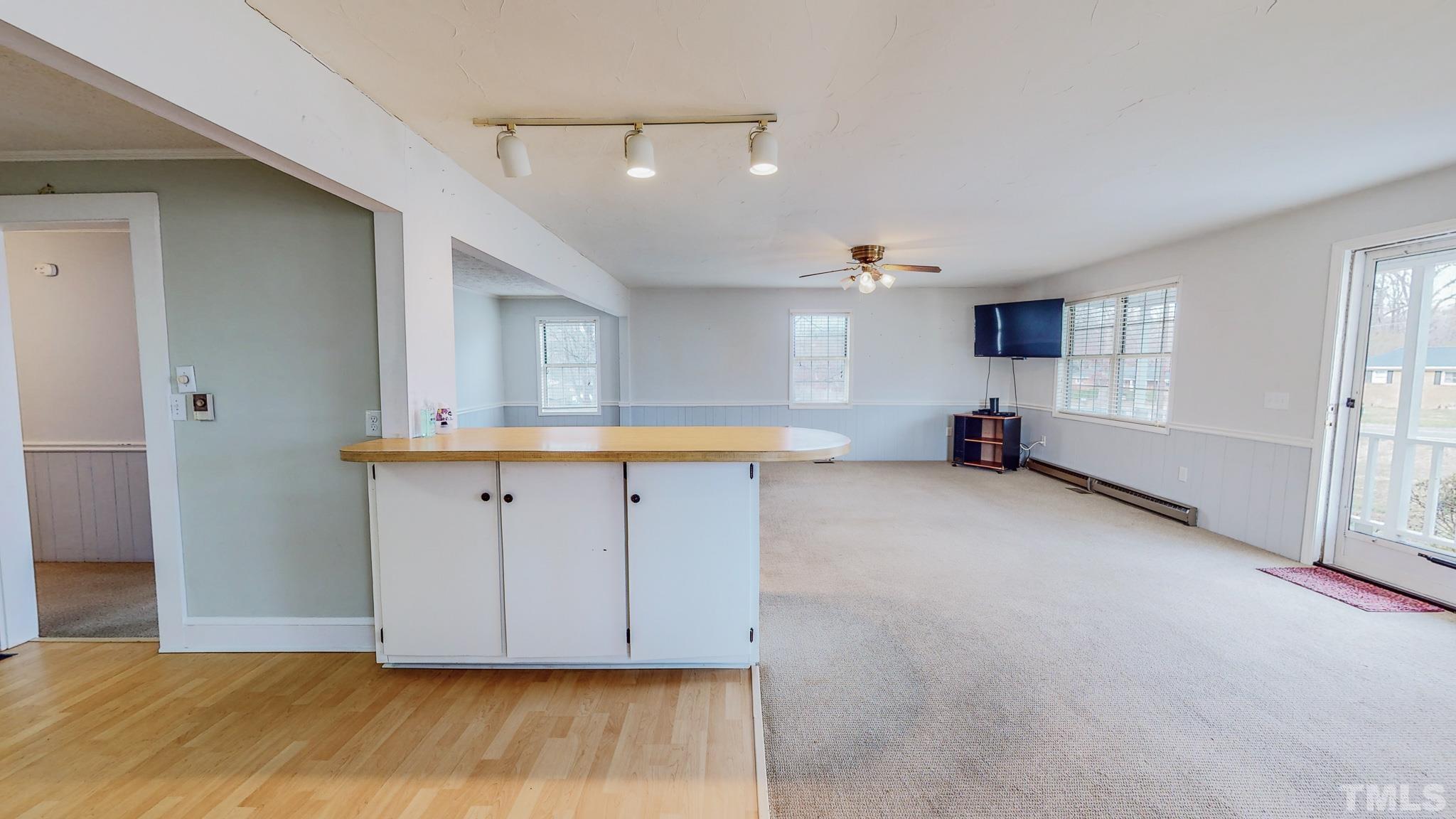 231 Patterson Drive Roxboro, NC 27573 - Photo 12 of 41 a view of kitchen with refrigerator and window