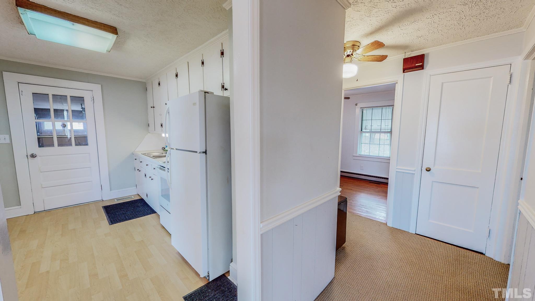 231 Patterson Drive Roxboro, NC 27573 - Photo 22 of 41 a view of empty room with wooden floor