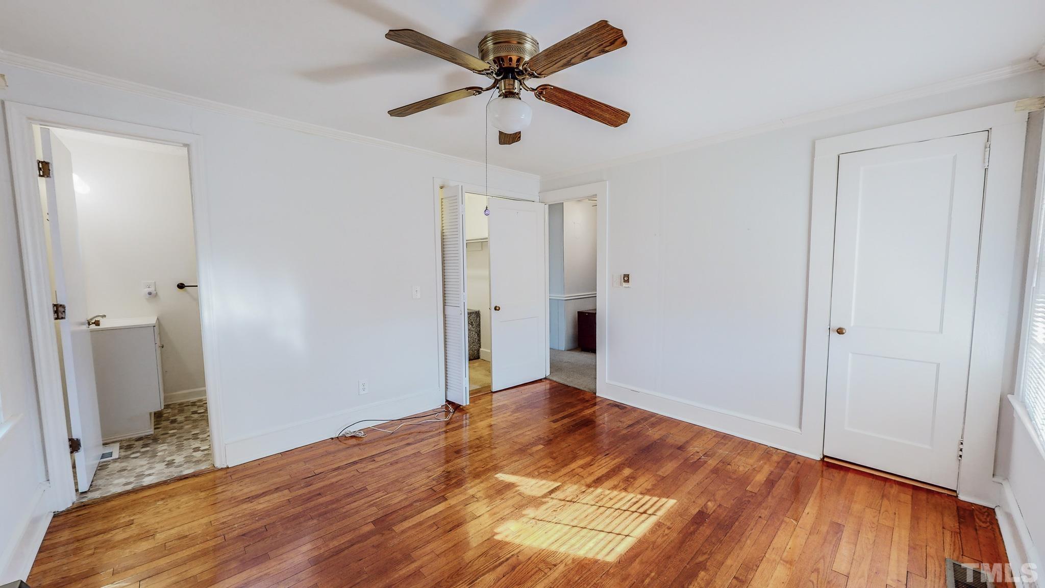 231 Patterson Drive Roxboro, NC 27573 - Photo 25 of 41 a view of empty room with wooden floor