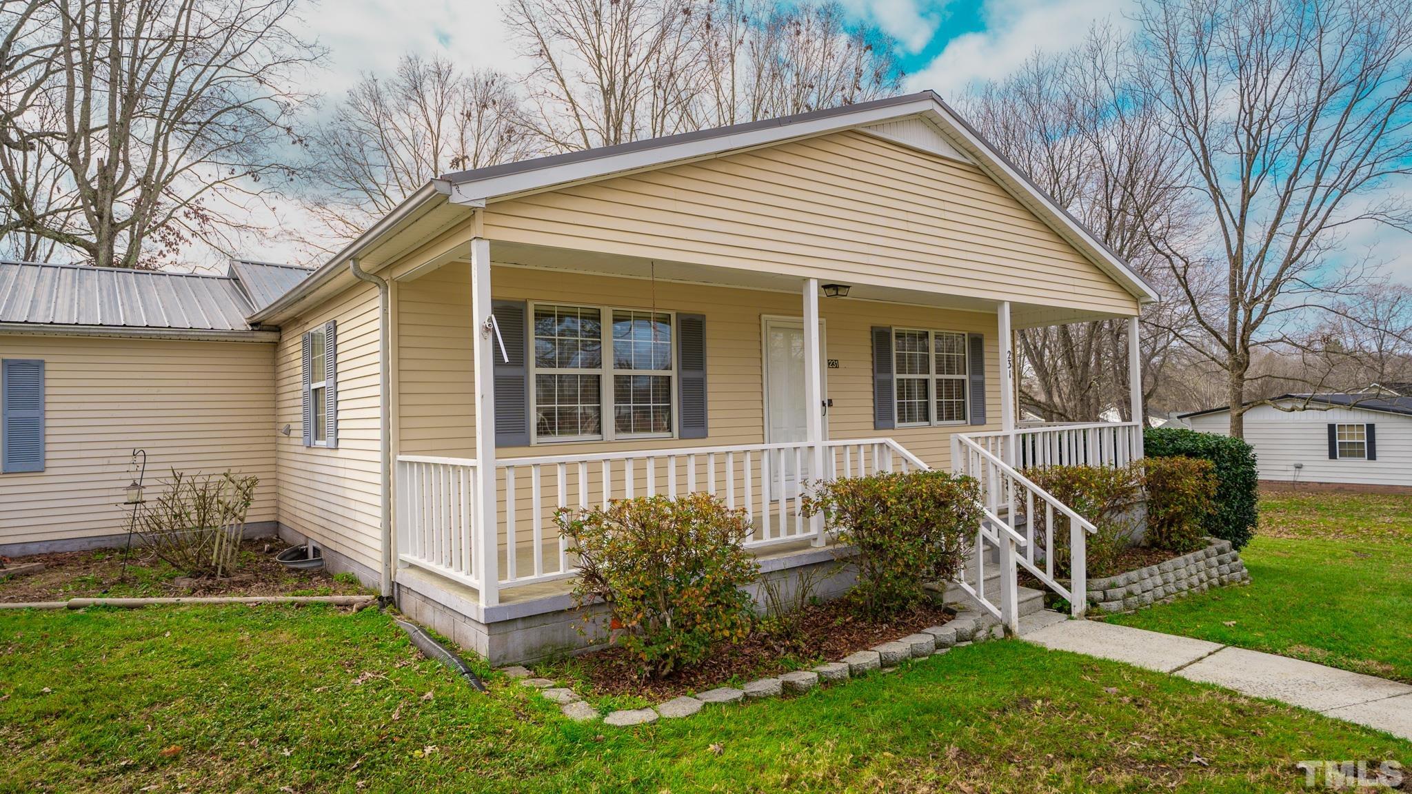 231 Patterson Drive Roxboro, NC 27573 - Photo 36 of 41 a view of a house with backyard