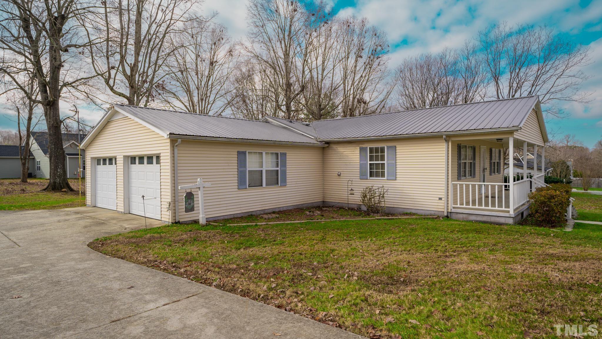 231 Patterson Drive Roxboro, NC 27573 - Photo 38 of 41 a view of a house with a yard
