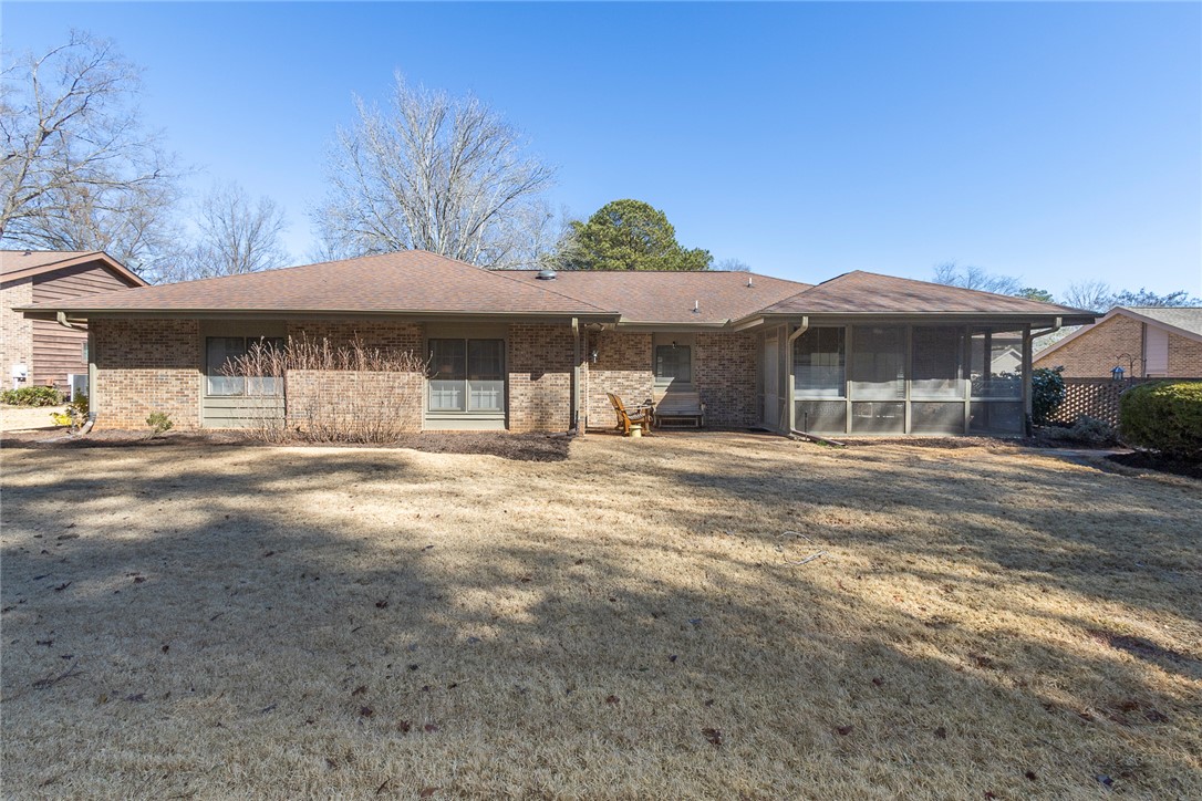 52 Hickory Way Clemson, SC 29631 - Photo 33 of 49 This residence features a large backyard and an inviting screened porch.