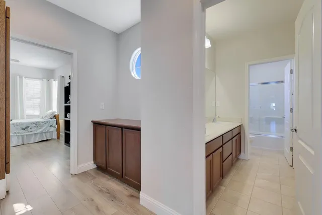 a view of a patio with a table and chairs