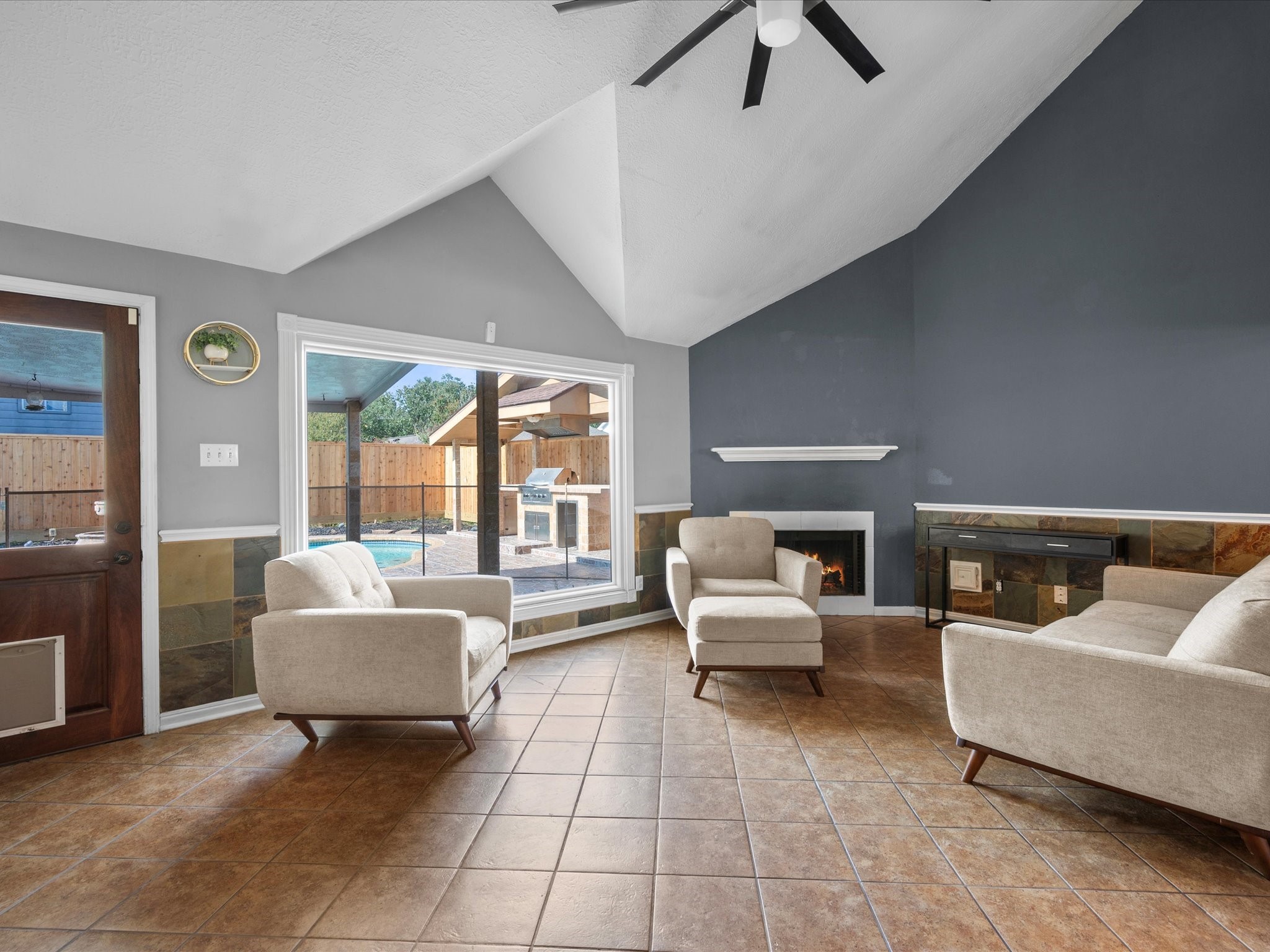 21450 Park Post Lane Katy, TX 77450 - Photo 11 of 46 a living room with furniture and a floor to ceiling window