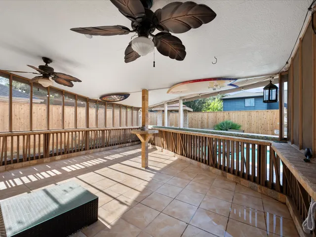 a view of two chairs in the balcony