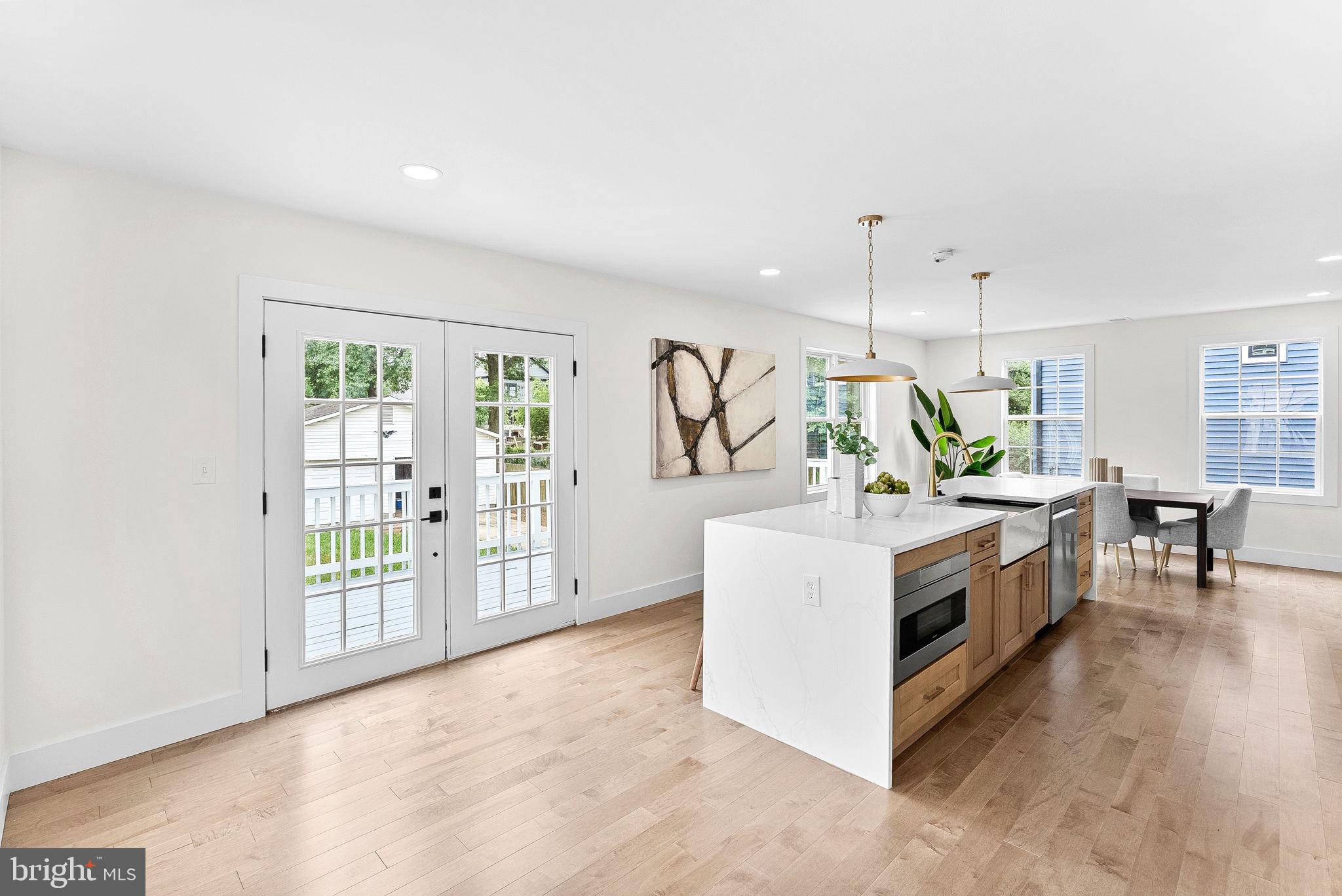 1805 South Pollard Street Arlington, VA 22204 - Photo 26 of 55 a kitchen with stainless steel appliances a stove top oven