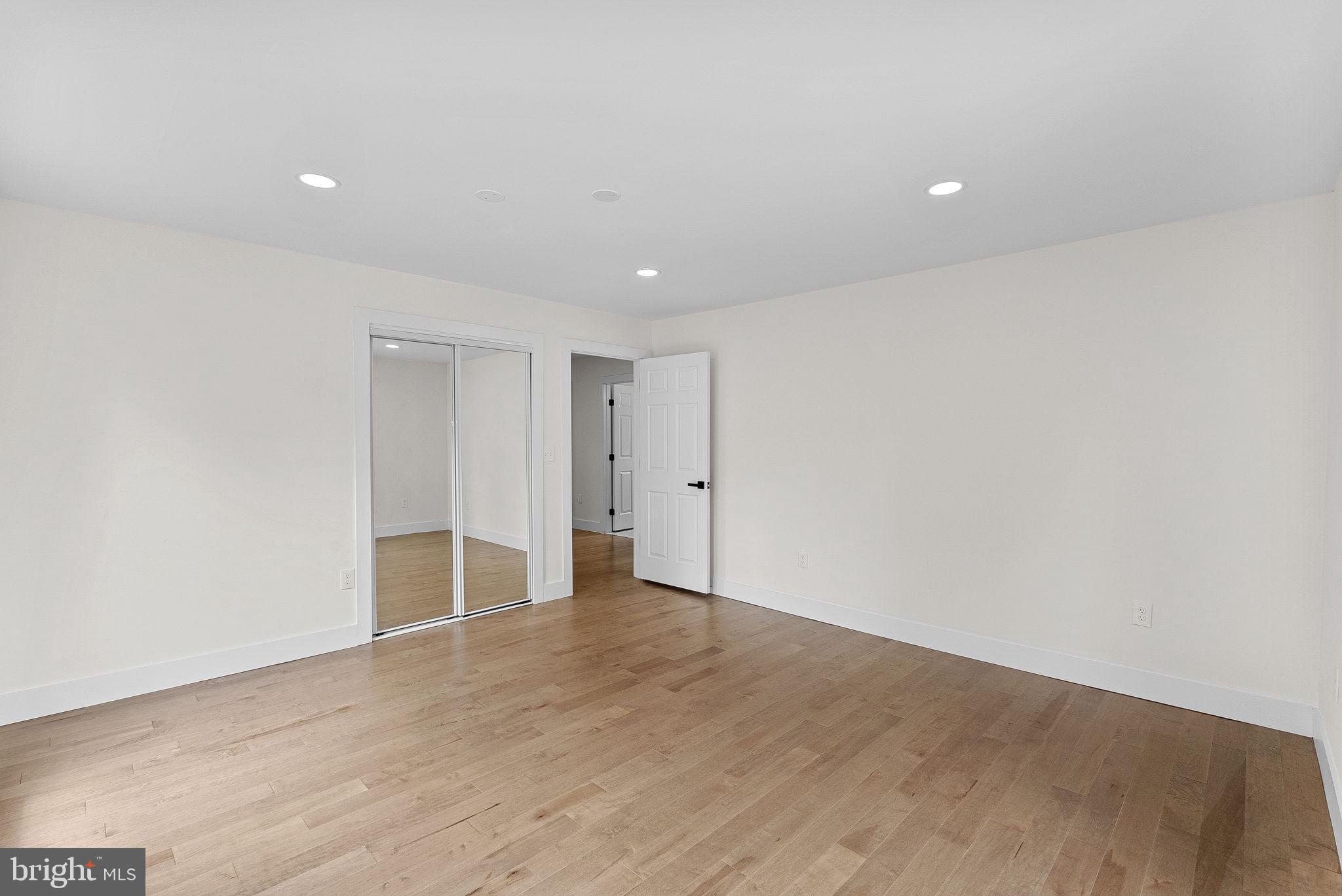 1805 South Pollard Street Arlington, VA 22204 - Photo 40 of 55 a view of an empty room with wooden floor