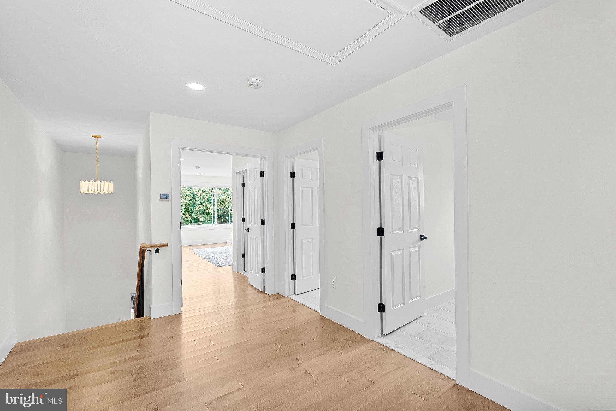1805 South Pollard Street Arlington, VA 22204 - Photo 47 of 55 a view of a hallway with wooden floor