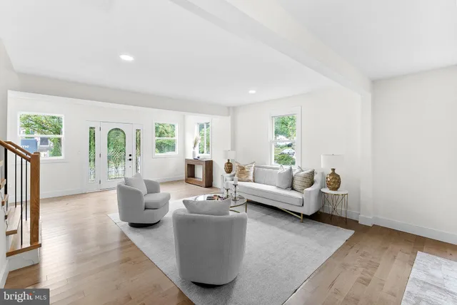 a living room with furniture and window