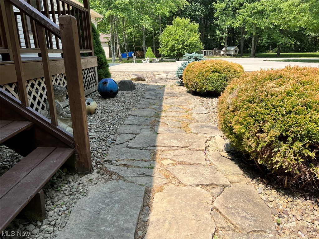 17615 Rock Creek Road Thompson, OH 44086 - Photo 35 of 35 In-laid stone walk way to the front porch