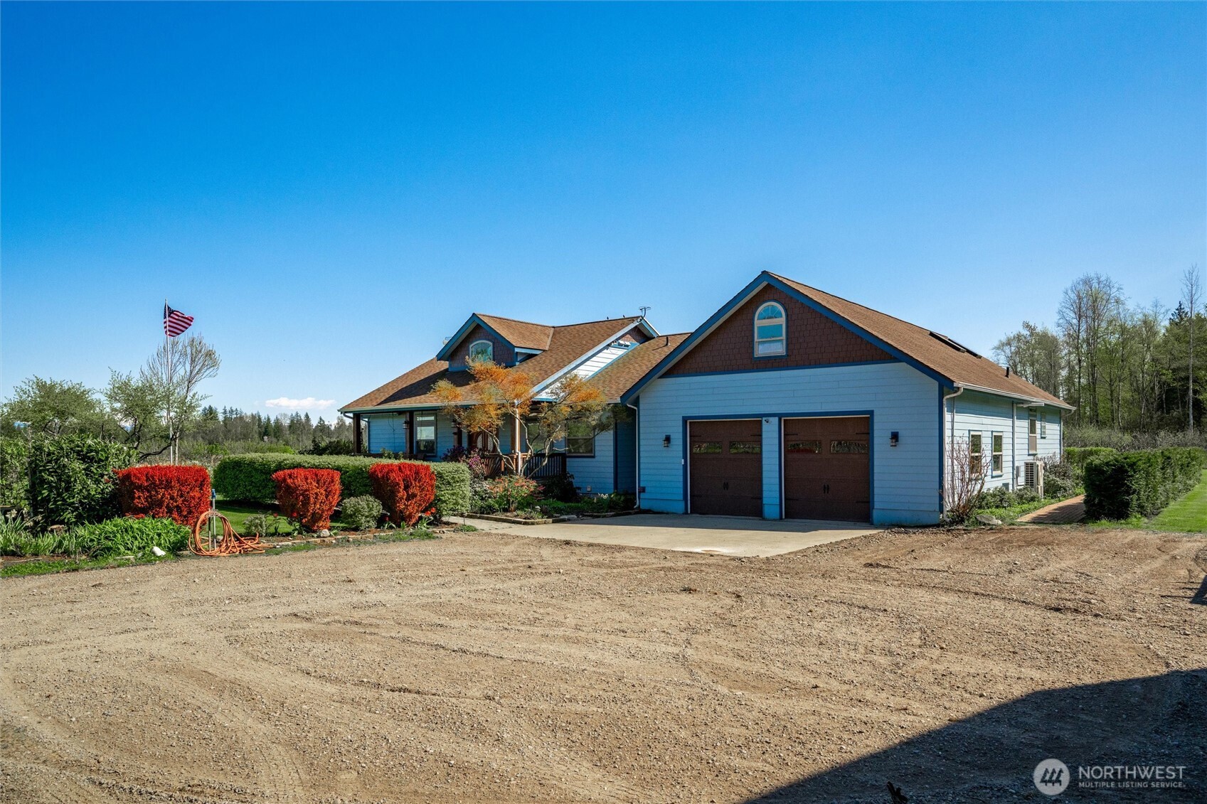 3151 Velvet Lane Custer, WA 98240 - Photo 23 of 40 a front view of a house with a yard and garage