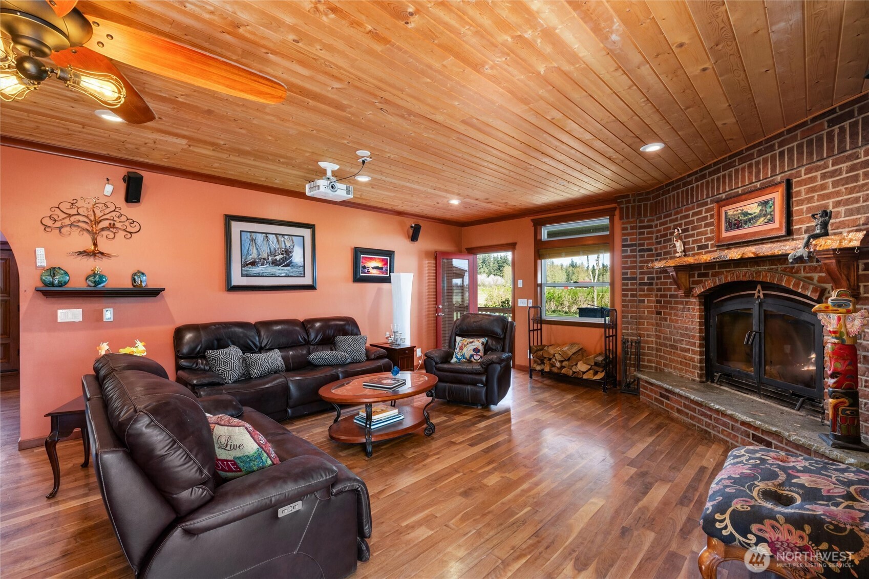 3151 Velvet Lane Custer, WA 98240 - Photo 7 of 40 a living room with furniture a fireplace and a flat screen tv