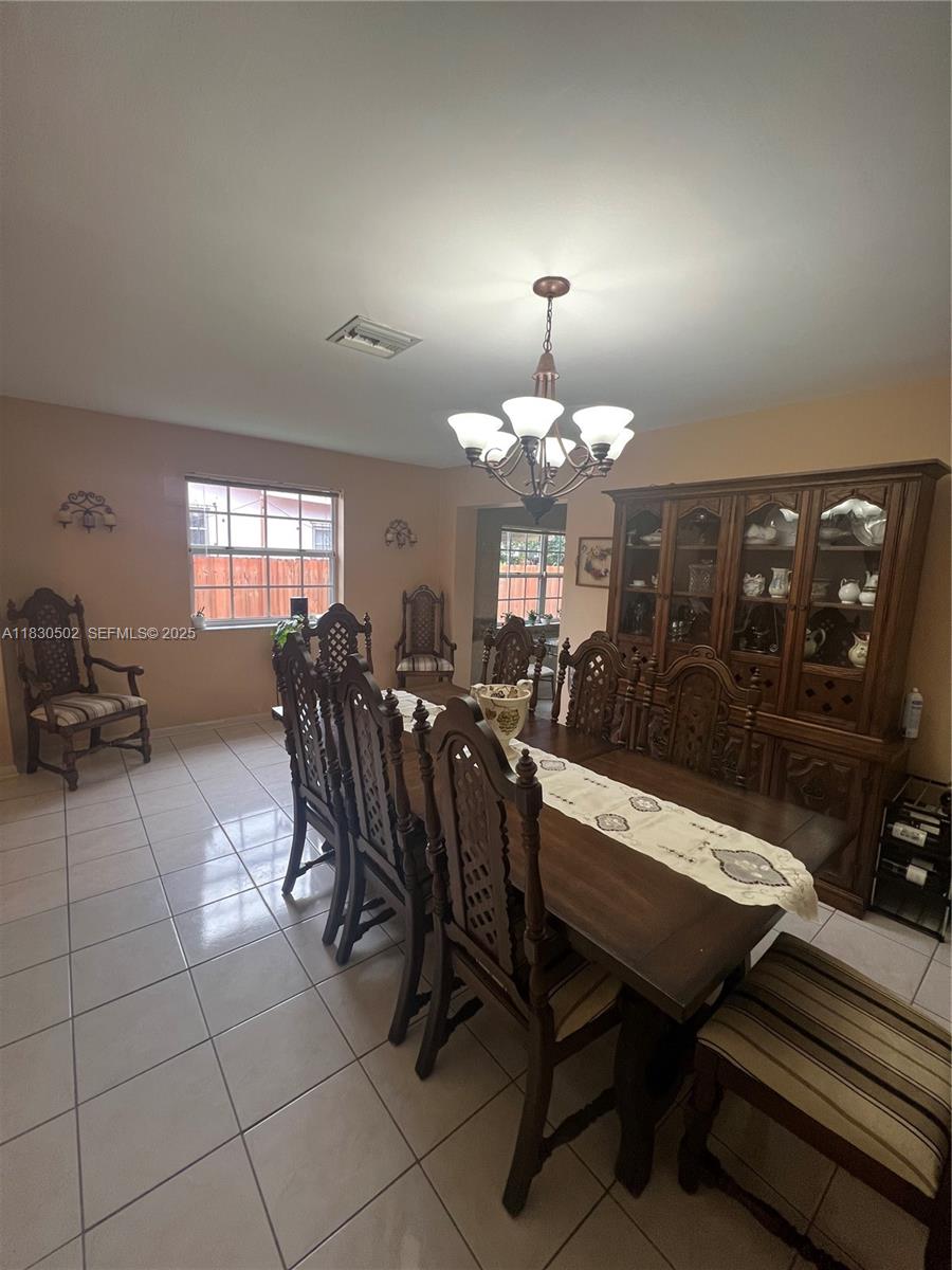 2815 Southwest 36th Avenue Miami, FL 33133 - Photo 11 of 25 a view of a dining room with furniture