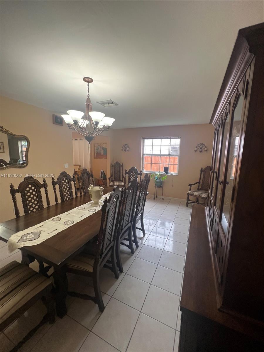 2815 Southwest 36th Avenue Miami, FL 33133 - Photo 10 of 25 a view of a dining room with furniture