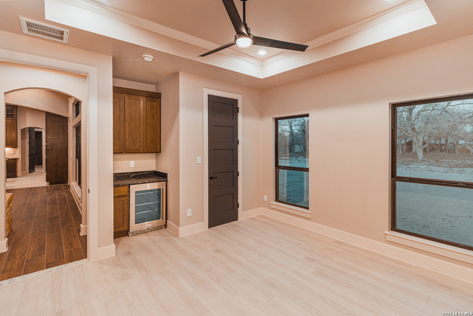 176 Hondo Ridge La Vernia, TX 78121 - Photo 13 of 28 a view of a hallway with wooden floor and cabinet