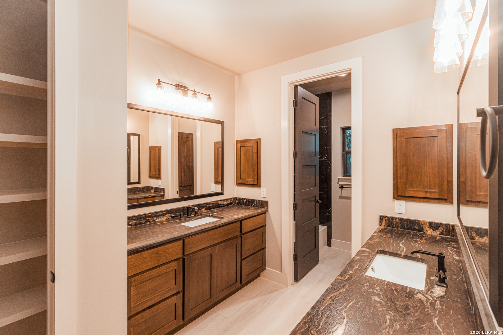 176 Hondo Ridge La Vernia, TX 78121 - Photo 16 of 28 a kitchen with stainless steel appliances granite countertop a refrigerator and a stove