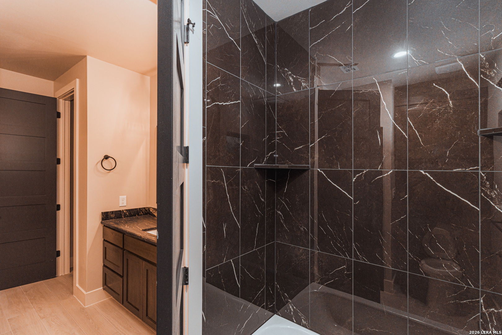 176 Hondo Ridge La Vernia, TX 78121 - Photo 17 of 28 a bathroom with a shower and a sink