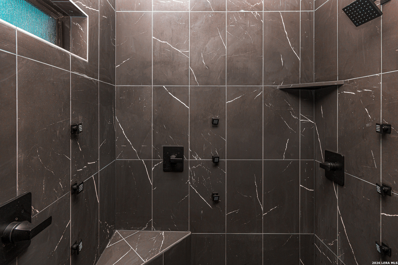 176 Hondo Ridge La Vernia, TX 78121 - Photo 23 of 28 a bathroom with a shower