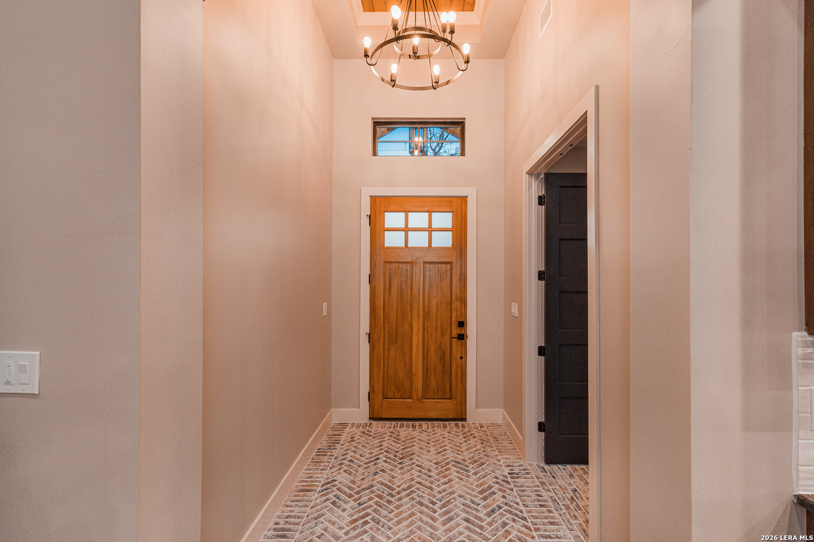 176 Hondo Ridge La Vernia, TX 78121 - Photo 5 of 28 a view of a hallway with front door