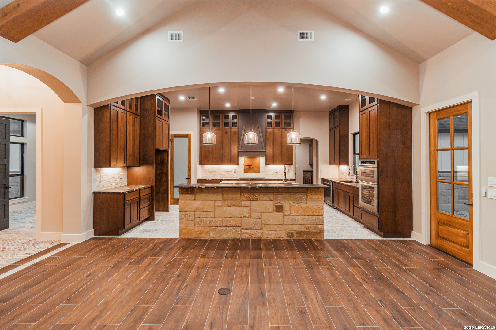 176 Hondo Ridge La Vernia, TX 78121 - Photo 9 of 28 a large kitchen with a large counter top appliances and cabinets