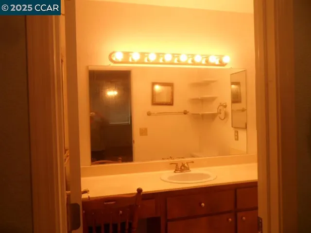 a bathroom with a toilet and shower