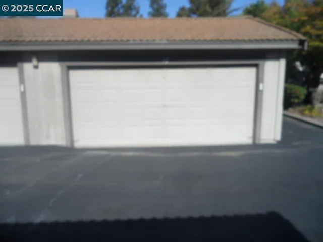 a view of a backyard of the house