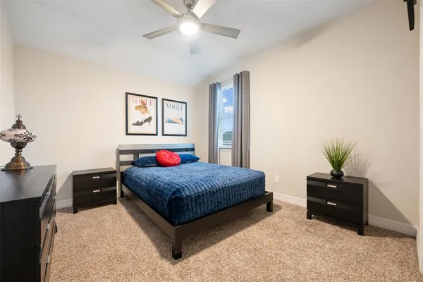 a view of an empty room with a kitchen