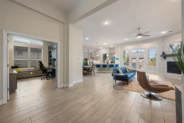 a living room with furniture and a table