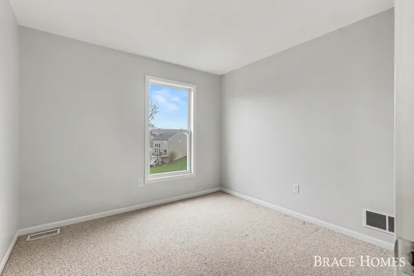 $570,000 | 2511 Black Horse Dr N East, Grand Rapids, MI 49505