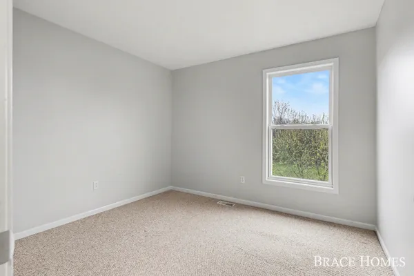 $570,000 | 2511 Black Horse Dr N East, Grand Rapids, MI 49505