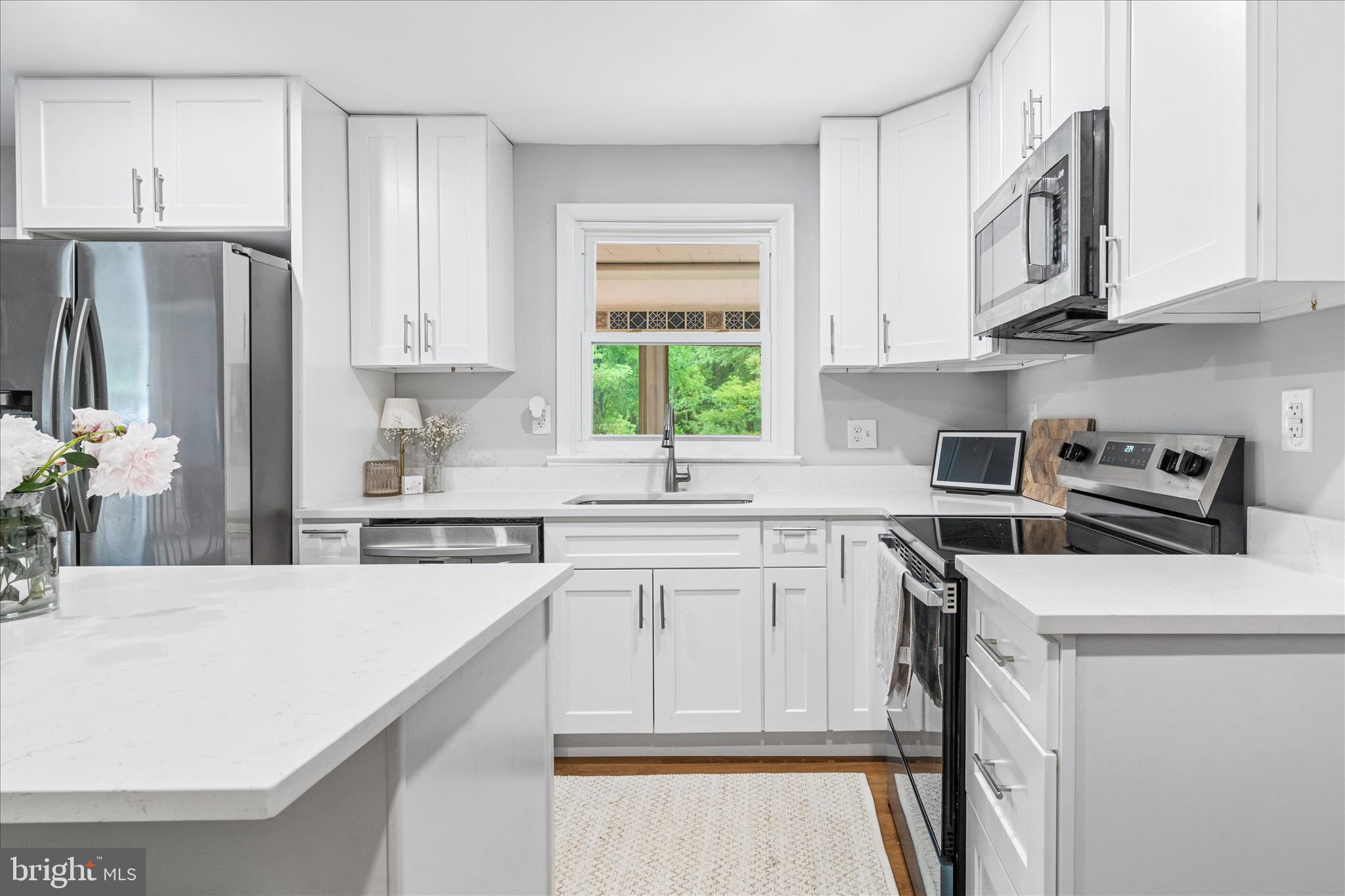 4217 Bill Moxley Road Mount Airy, MD 21771 - Photo 17 of 57 a kitchen with appliances cabinets and a sink