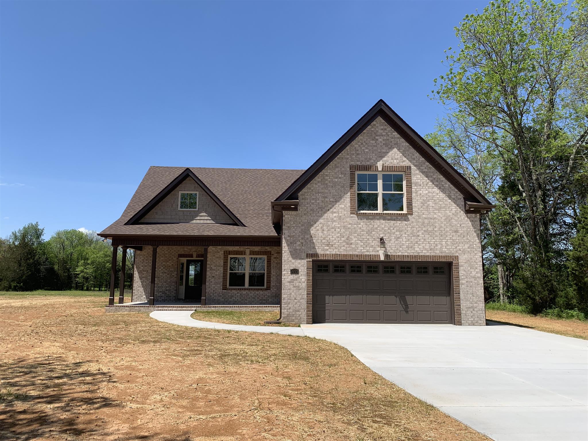 9993 McKee Road Lascassas, TN 37085 - Photo 1 of 30 All brick home on 1.3 acres.