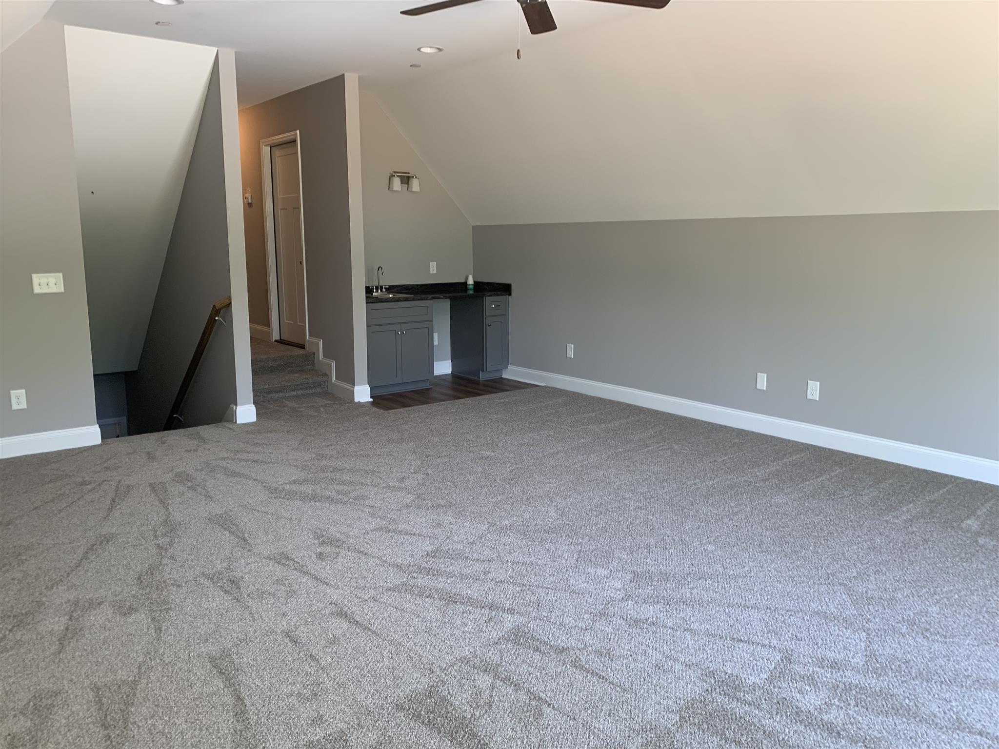 9993 McKee Road Lascassas, TN 37085 - Photo 24 of 30 Hallway off of the bonus with storage room.